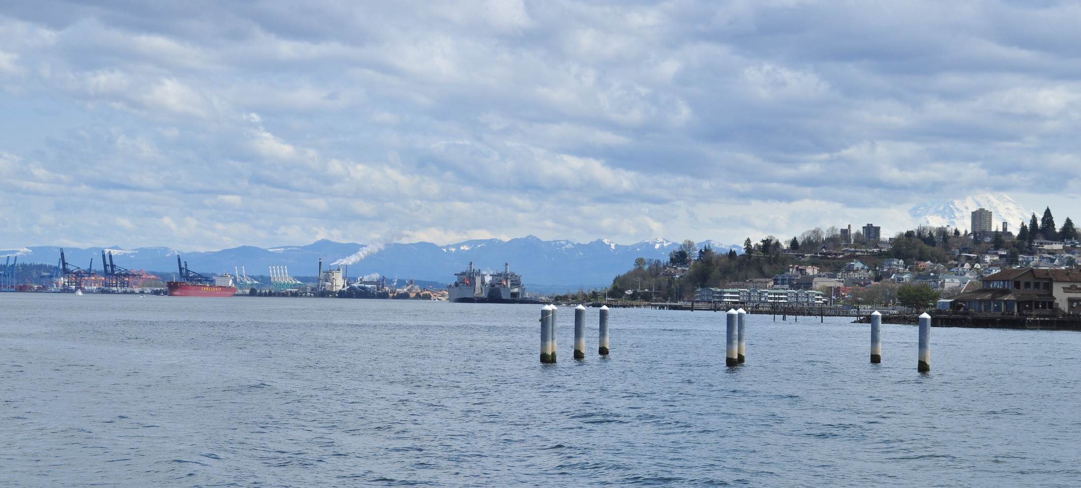 Commencement Bay seen from Ruston Way, with port cranes on the far shore and the Tacoma shoreline to the right